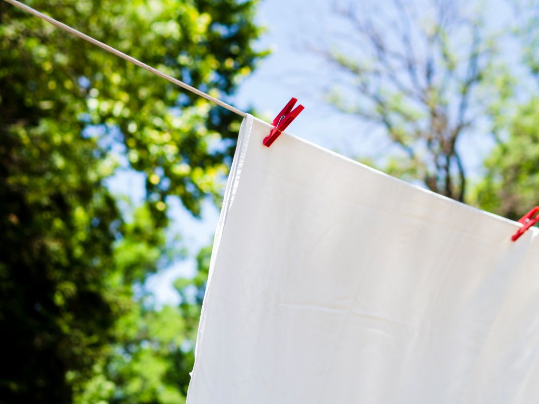 close-up-white-sheet-drying-on-the-line_1_1.jpg
